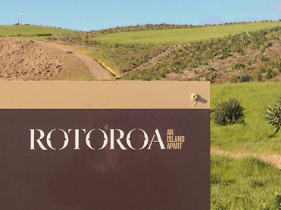 Rotoroa sign infront of hills Native Solutions NZ